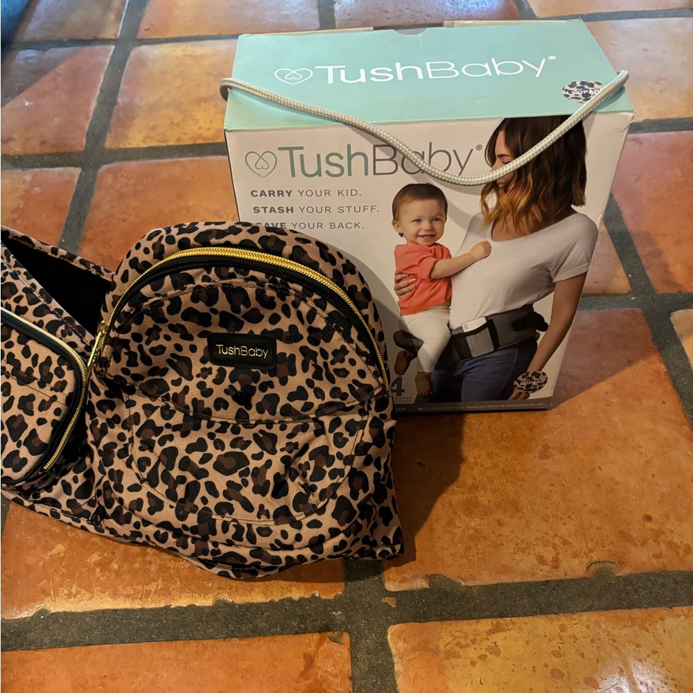 Tush Baby. Like new! Leopard print